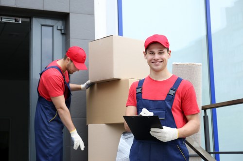 Driver preparing a moving van for transport