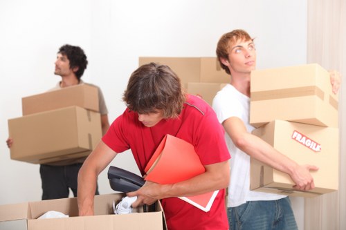 Packing and transporting desks, files, and IT for an office relocation