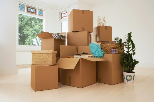 Boxes and furniture arranged in a new home after moving