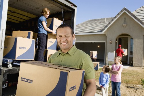 Loading items into a van for transport around Nags Head